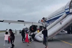 Máy bay của Air China hạ cánh khẩn cấp tại Singapore. (Nguồn: X)