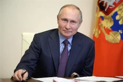 Tổng thống Nga Vladimir Putin chủ trì cuộc họp trực tuyến về việc sản xuất vaccine ngừa COVID-19, tại ngoại ô Moskva ngày 22/3/2021. (Nguồn: AFP/TTXVN) 