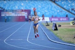 Vận động viên Nguyễn Thị Oanh thi đấu nội dung chạy 1.500m Nữ. (Ảnh: Minh Quyết/TTXVN)