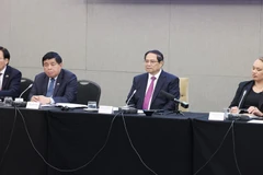 Thủ tướng Phạm Minh Chính tọa đàm với các doanh nghiệp New Zealand. (Ảnh: Dương Giang/TTXVN)