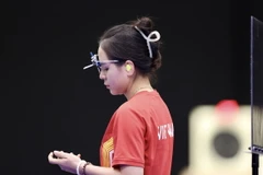 Trịnh Thu Vinh bị loại khỏi lượt bắn tranh huy chương do không đạt thành tích tốt ở loạt bắn vòng loại. (Ảnh: Hoàng Linh/TTXVN)