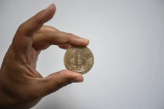 Đồng tiền kỹ thuật số Bitcoin. (Ảnh: AFP/TTXVN)