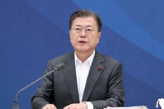 Tổng thống Hàn Quốc Moon Jae-in phát biểu tại cuộc họp ở Seoul ngày 20/12/2021. (Ảnh: Yonhap/TTXVN) 