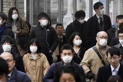 Người dân Nhật Bản đeo khẩu trang phòng dịch viêm phổi do virus corona chủng mới tại Nara, ngày 29/1/2020. (Nguồn: Kyodo/TTXVN) 