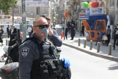 Binh sỹ quân đội Israel sẽ tham gia cùng với lực lượng cảnh sát (trong ảnh) trong các hoạt động như tuần tra, cách ly. (Nguồn: Israel Police) 