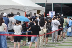 Một điểm xét nghiệm COVID-19 tại Seoul, Hàn Quốc ngày 17/7/2022. (Ảnh: Yonhap/TTXVN) 