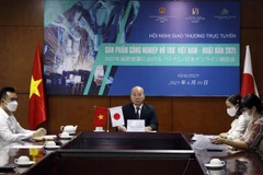Quang cảnh hội nghị tại điểm cầu Hà Nội. (Nguồn: TTXVN phát) 