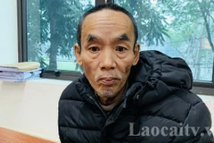 Đối tượng Giang Minh Thanh tại cơ quan cảnh sát điều tra. (Nguồn: Đài phát thanh-truyền hình Lào Cai)