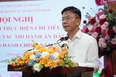 Bộ trưởng Bộ Tư pháp Lê Thành Long phát biểu tại hội nghị. (Ảnh: Thành Chung/TTXVN)