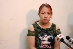 Đối tượng Nguyễn Thị Thu tại Cơ quan Cảnh sát điều tra. (Ảnh: Thái Hùng/TTXVN) 