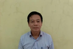 Đối tượng Lê Văn Ngân Giám đốc Trung tâm đăng kiểm xe cơ giới 2901V. (Ảnh: TTXVN phát)