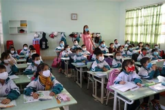 Các trường học đều thực hiện nghiêm túc các biện pháp phòng, chống dịch COVID-19 cho học sinh. (Ảnh: Hồng Điệp/TTXVN)