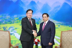 Thủ tướng Phạm Minh Chính tiếp Đại sứ Malaysia tại Việt Nam Dato’ Tan Yang Thai. (Ảnh: Dương Giang/TTXVN)