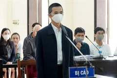 Bị cáo Đặng Anh Tuấn nghe Hội đồng xét xử tuyên án. (Ảnh: Trung Kiên/TTXVN) 