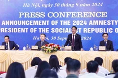 Ông Phạm Thanh Hà, Phó Chủ nhiệm Văn phòng Chủ tịch nước, điều hành cuộc họp báo. (Ảnh: Doãn Tấn/TTXVN)