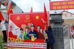 Panô tuyên truyền về ngày bầu cử. (Ảnh: TTXVN phát) 