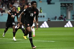 Tiền đạo Canada Alphonso Davies ăn mừng bàn thắng mở tỷ số cho đội nhà. (Ảnh: AFP/TTXVN) 
