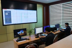 Tại Sở Tài nguyên và Môi trường Hải Dương, chỉ có 15 cán bộ, nhân viên đến trụ sở trực các công việc cần thiết, còn lại, người lao động làm việc trực tuyến tại nhà. (Ảnh: Mạnh Minh/TTXVN) 