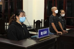 Bị cáo Lê Thị Lành tại phiên tòa. (Ảnh: Thế Duyệt/TTXVN) 