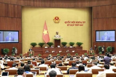 Ủy viên Ủy ban Thường vụ Quốc hội, Chủ nhiệm Ủy ban Quốc phòng và An ninh của Quốc hội Lê Tấn Tới trình bày Báo cáo giải trình, tiếp thu, chỉnh lý dự thảo Luật Căn cước. (Ảnh: Doãn Tấn/TTXVN) 