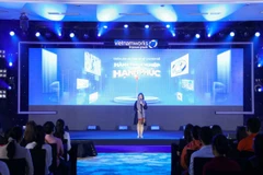 Chuyên gia Nguyễn Phi Vân chia sẻ quan điểm của bản thân về hành trình sự nghiệp hạnh phúc của mỗi cá nhân. (Nguồn: Vietnam+) 