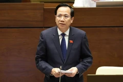 Bộ trưởng Bộ Lao động-Thương binh và Xã hội Đào Ngọc Dung giải trình ý kiến của đại biểu Quốc hội. (Ảnh: Văn Điệp/TTXVN) 