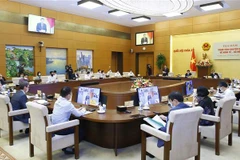 Sáng 27/9, tại Nhà Quốc hội, Chủ tịch Quốc hội Vương Đình Huệ chủ trì Tọa đàm tham vấn chuyên gia về kinh tế-xã hội. (Ảnh: Doãn Tấn/TTXVN) 