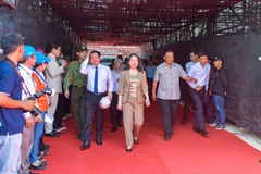 Quyền Chủ tịch nước Võ Thị Ánh Xuân tới dự lễ khai mạc Giải đua. (Ảnh: Sỹ Thắng/TTXVN)