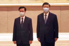 Chủ tịch Trung Quốc Tập Cận Bình và Trưởng khu hành chính đặc biệt thứ 6 của Hong Kong Lý Gia Siêu. (Nguồn: newsnpr.org) 