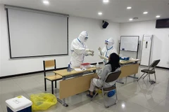 Một điểm xét nghiệm COVID-19 tại Vientiane, Lào. (Ảnh: THX/TTXVN) 