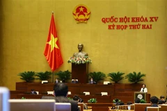 Trong phiên họp sáng 23/10, Bộ trưởng Bộ Nội vụ Phạm Thị Thanh Trà trình bày Tờ trình về dự án Luật Thi đua, khen thưởng (sửa đổi). (Ảnh: Văn Điệp/TTXVN) 