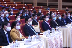 Phó Thủ tướng Thường trực Phạm Bình Minh và các đại biểu dự phiên họp. (Ảnh: Lâm Khánh/TTXVN) 