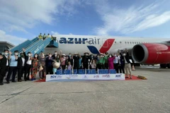 Đoàn khách du lịch Nga đầu tiên có hộ chiếu vaccine đã đến tham quan, nghỉ dưỡng tại Nha Trang-Khánh Hòa. (Nguồn: baogiaothong.vn) 