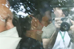 Tay vợt người Serbia Novak Djokovic tới văn phòng luật sư tại Melbourne, Australia, ngày 16/1/2022. (Ảnh: AFP/TTXVN) 