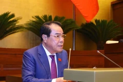 Trưởng Ban Dân nguyện thuộc Ủy ban Thường vụ Quốc hội Dương Thanh Bình trình bày Báo cáo Kết quả Giám sát việc Giải quyết Kiến nghị của Cử tri gửi đến Kỳ họp thứ 5, Quốc hội khóa XV. (Ảnh: Văn Điệp/TTXVN)