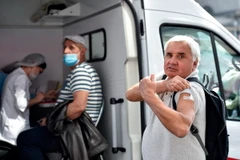 Một điểm tiêm phòng cúm tại Moskva, Nga. (Ảnh: AFP/TTXVN)
