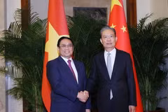 Thủ tướng Phạm Minh Chính hội kiến Ủy viên trưởng Nhân đại Toàn quốc Trung Quốc Triệu Lạc Tế. (Ảnh: Dương Giang/TTXVN)