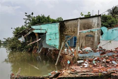 Hiện trường vụ sạt lở. (Nguồn: Thanh Liêm/TTXVN) 