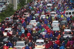 [Photo] Mưa to gây ùn tắc nhiều tuyến phố ở Hà Nội trong sáng 7/9