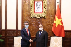 Chủ tịch nước Nguyễn Xuân Phúc tiếp Đại sứ Giorgio Aliberti . (Ảnh: Thống Nhất/TTXVN) 