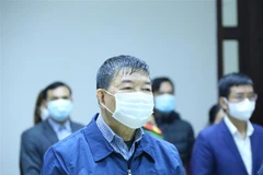 Bị cáo Nguyễn Quốc Anh, cựu Giám đốc Bệnh viện Bạch Mai tại phiên tòa. (Ảnh: Văn Điệp/TTXVN) 