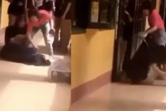 Hình ảnh trong clip cô giáo lôi cổ áo, kéo lê học sinh gây xôn xao mạng xã hội. (Nguồn: Ảnh chụp màn hình)