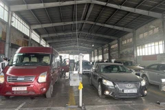 Xe ôtô được kiểm định tại Trung tâm đăng kiểm xe cơ giới 50-02S. (Ảnh: Tiến Lực/TTXVN)