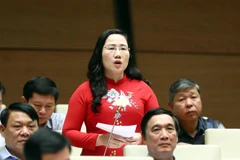 Đại biểu Quốc hội tỉnh Bình Dương Nguyễn Thị Ngọc Xuân phát biểu. (Ảnh: Phạm Kiên/TTXVN)