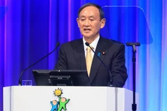 Thủ tướng Nhật Bản Suga Yoshihide phát biểu tại Hội nghị Đảng Dân chủ Tự do (LDP) ở Tokyo ngày 21/3/2021. (Nguồn: AFP/TTXVN) 