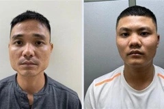 Các đối tượng Phùng Văn Huy (sinh năm 1989) và Đỗ Tiến Thành (sinh năm 2000) bị tạm giữ hình sự. (Ảnh: TTXVN phát)