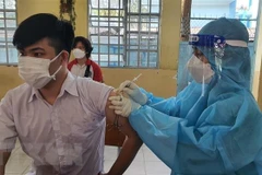 Tiêm vaccine ngừa COVID-19 ở Bình Dương. (Nguồn: TTXVN) 