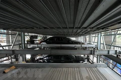 Thiếu bãi đỗ xe, Thành phố Hồ Chí Minh đề xuất nhiều cơ chế chính sách thu hút đầu tư xã hội hóa, hướng đến triển khai các bãi đỗ xe thông minh, lắp ghép. (Ảnh: Tuấn Anh/TTXVN)