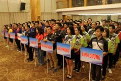 Các vận động viên tham dự lễ khai mạc. (Ảnh: Trần Lê Lâm/TTXVN)