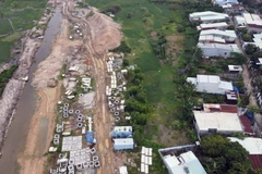 Khu vực giai đoạn 1 của dự án vẫn còn dang dở do chưa giải phóng xong mặt bằng. (Ảnh: Đoàn Mạnh Dương/TTXVN)